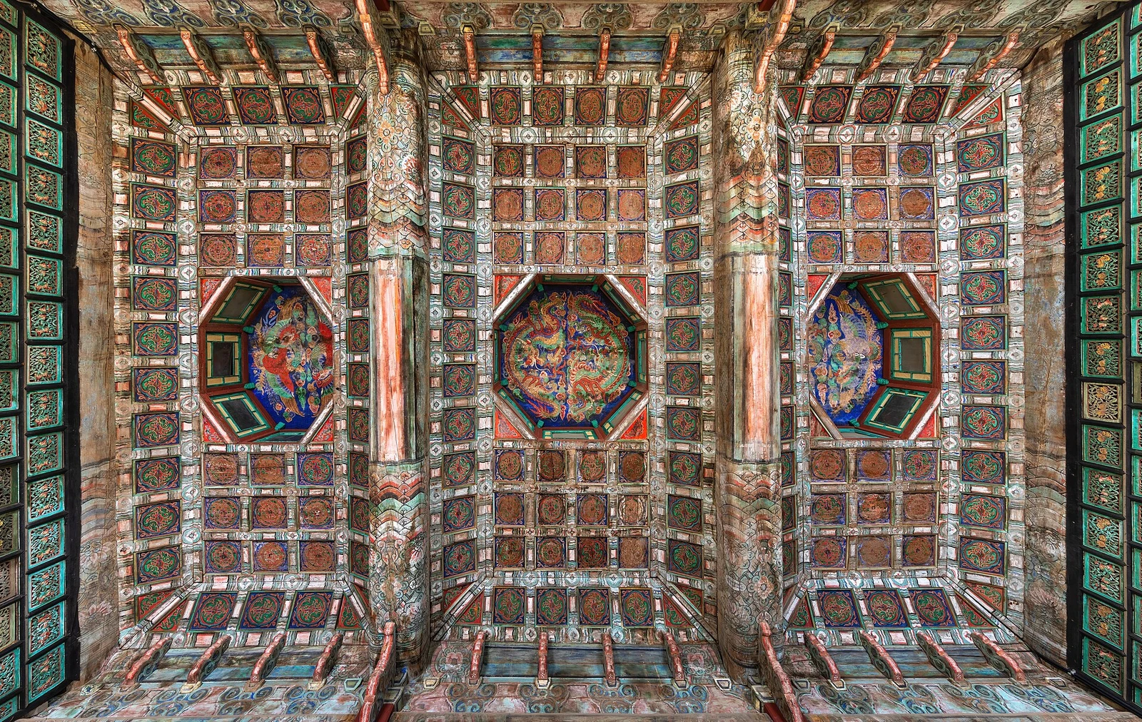Finely painted wooden ceiling of Jibokjae Hall seen from below at Gyeongbokgung Palace in Seoul.jpg